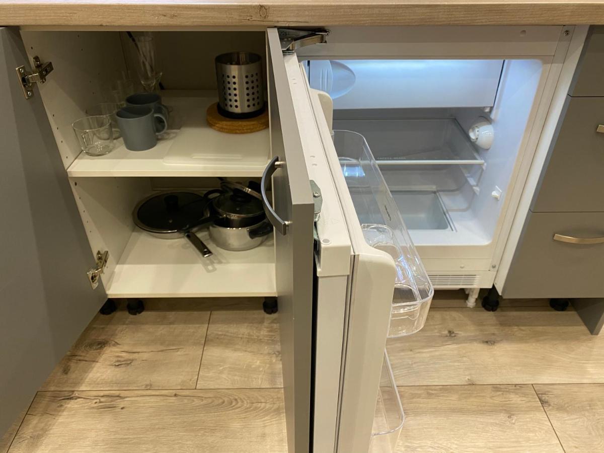 Aparthotel Riga Extérieur photo A refrigerator with a built-in ice maker