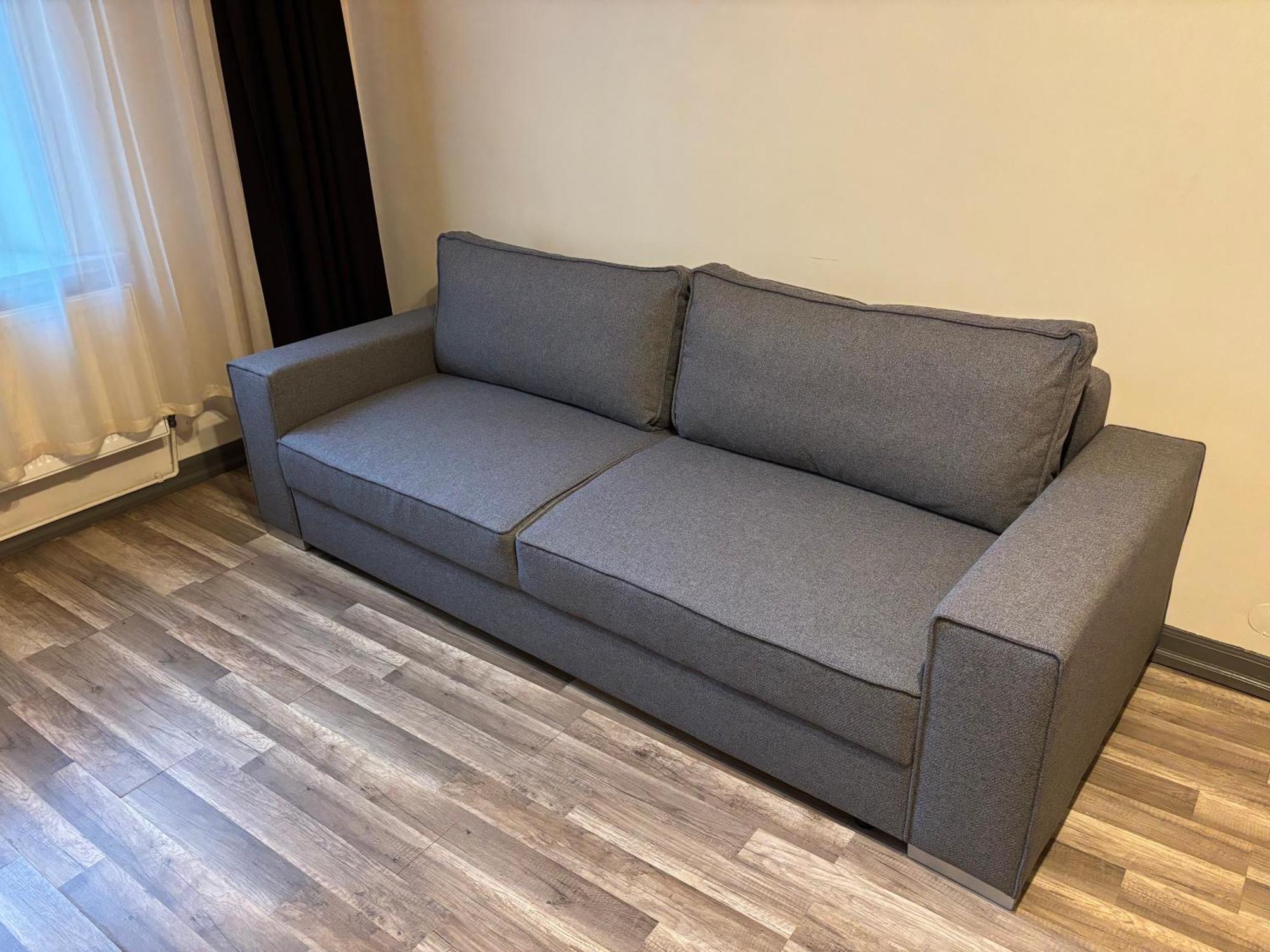 Aparthotel Riga Extérieur photo A sofa