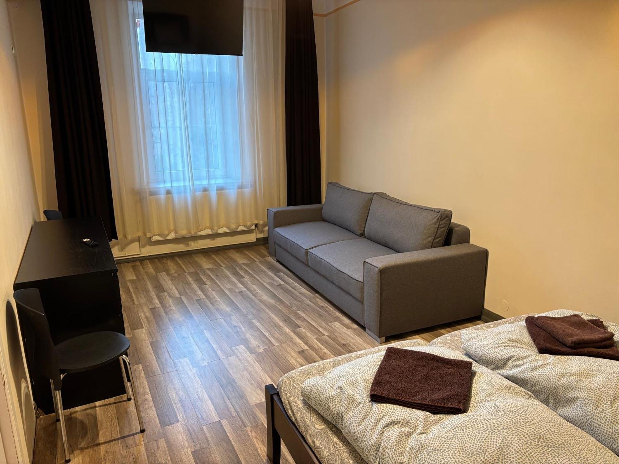 Aparthotel Riga Extérieur photo A typical room at the hostel