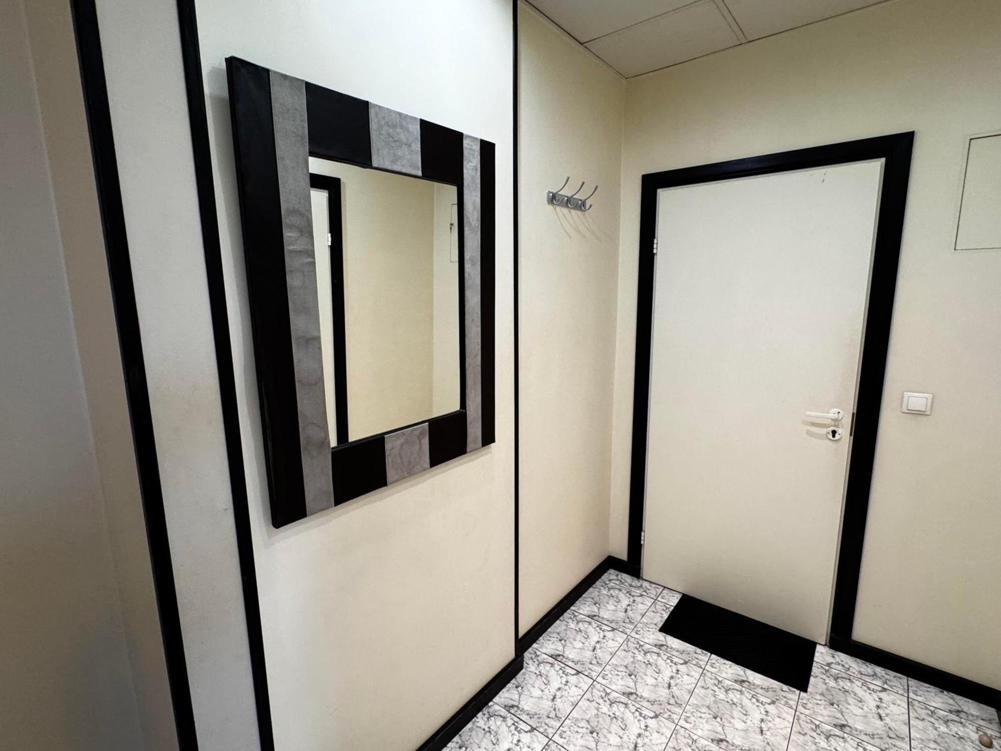 Aparthotel Riga Extérieur photo A mirror in a bathroom