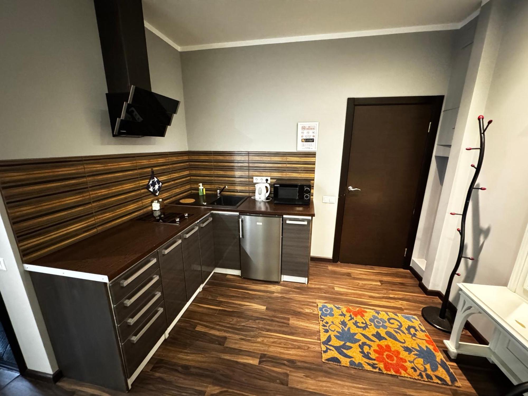 Aparthotel Riga Extérieur photo A typical kitchen in a typical apartment